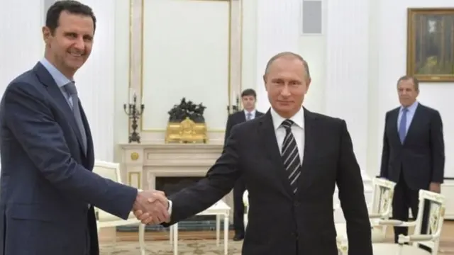 සිරියාවේ ජනාධිපති බෂර් අල් අසාද් සහ රුසියානු ජනාධිපති ව්ලැද්මීර් පුතින්