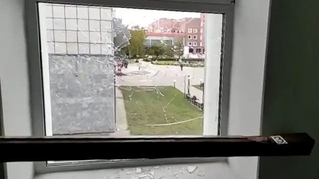 A broken window is pictured at the Perm State University