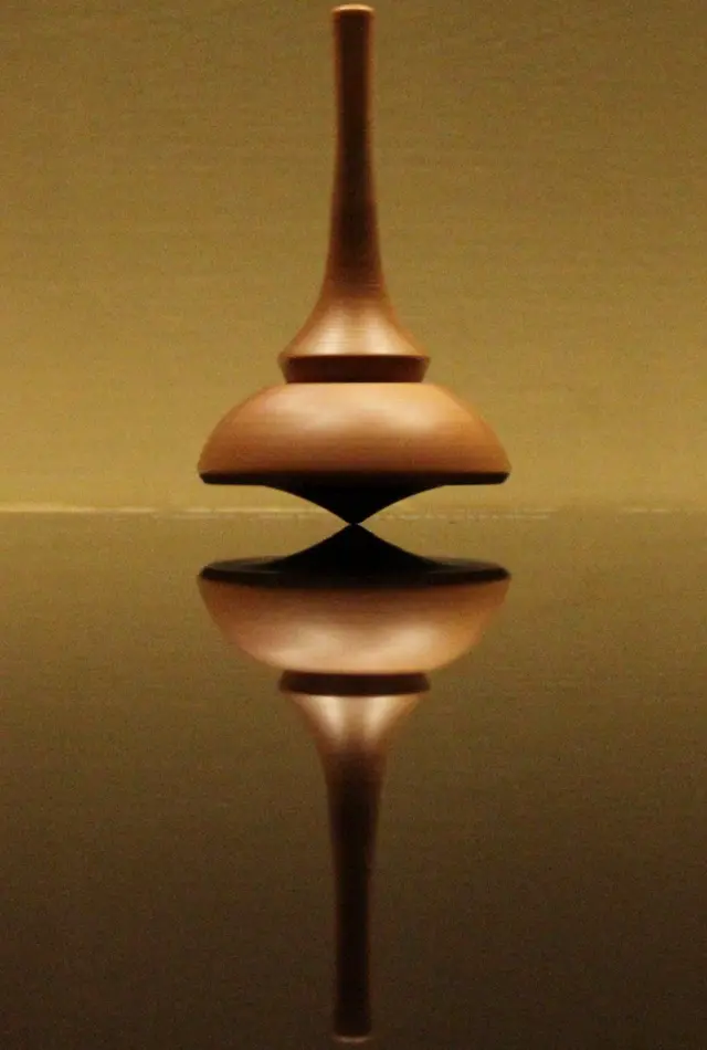 محاولة لعمل دوران متوازن لقطعة خشبية