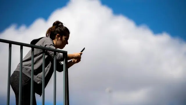 Woman checking her mobile