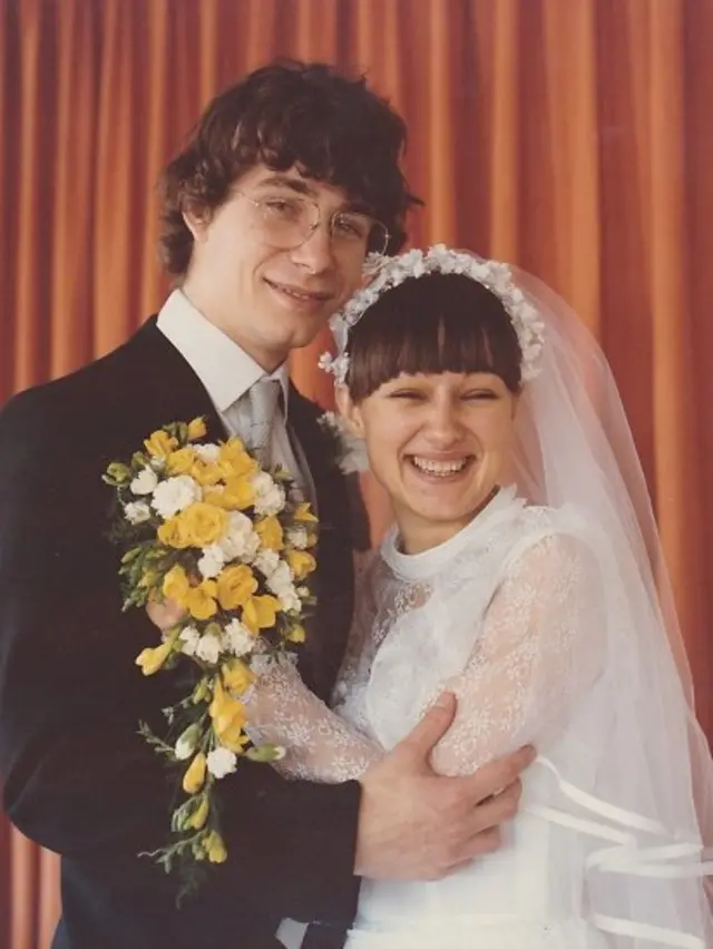 Fr Simon and his wife on their wedding day