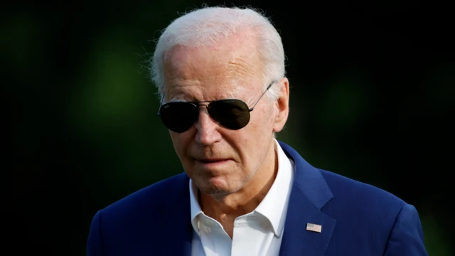 Close up of President Joe Biden in sunglasses
