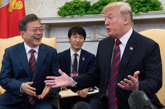 In this file photo taken on May 22, 2018, US President Donald Trump and South Korean President Moon Jae-in hold a meeting in the Oval Office of the White House in Washington, DC. Trump sees "brilliant potential" in North Korea, he tweeted on May 27, 2018, continuing an upbeat tone about a planned summit with the North"s leader Kim Jong Un. "I truly believe North Korea has brilliant potential and will be a great economic and financial Nation one day. Kim Jong Un agrees with me on this. It will happen!," said Trump, who had cancelled his June 12 meeting with Kim in Singapore, before reversing course within 24 hours. / AFP PHOTO / SAUL LOEBSAUL LOEB/AFP/Getty Images