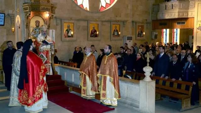 Halep'teki Hristiyanlar Noel ayinine katılıyorlar