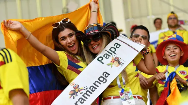 Wadansu magoya bayan kasar Colombia gabanin karawarsu da kasar Japan a ranar Talata