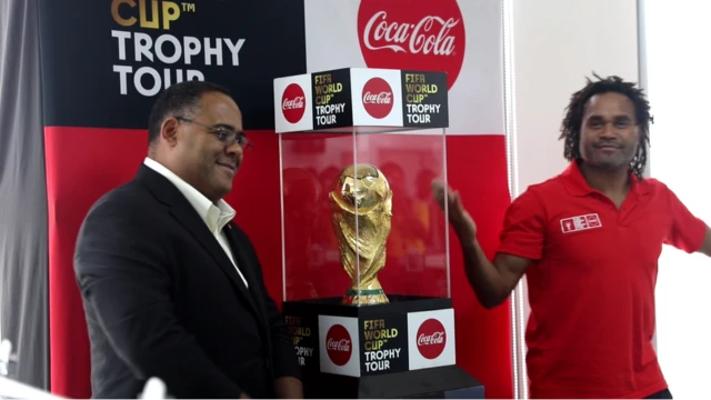 Christian Karembeu as im unveil di FIFA World cup trophy with person from Coco Cola for BBC Lagos office