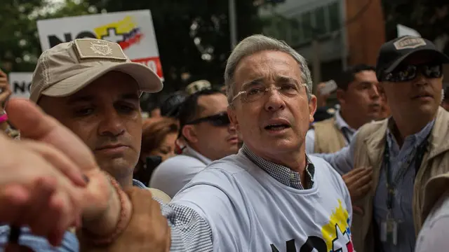 Партія пана Урібе виступає проти угоди, бо вважають, що вона занадто м'яка щодо злочинів під час конфлікту