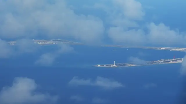 An aerial shot of Chinese-claimed reef Subi reef, from a Philippine airforce plane, as Defense Secretary Delfin Lorenzana along with some journalists visit the Philippine-claimed Thitu island just opposite Subi reef in Spratlys on April 21, 2017