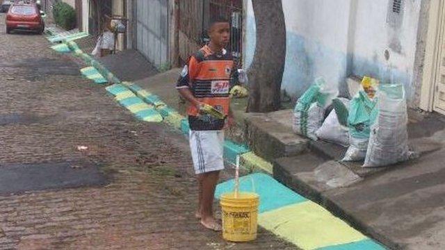 Gabriel Jesus pinta rua em São Paulo para a Copa de 2014