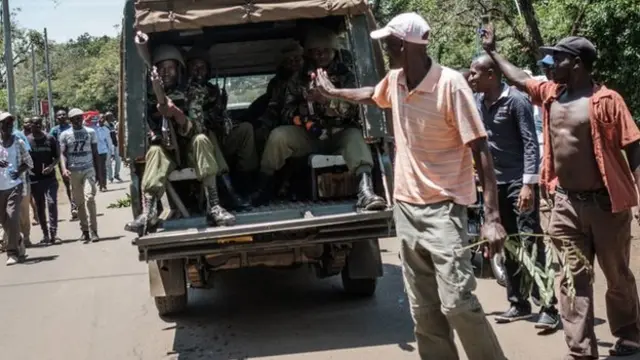 Soldiers and protesters for Kenya before repeat presidential elections for October