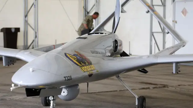 A Turkish Bayraktar TB2 combat drone on view during a presentation at the Lithuanian Air Force Base in Siauliai, Lithuania on 6 July which was planned to be sent to Ukraine