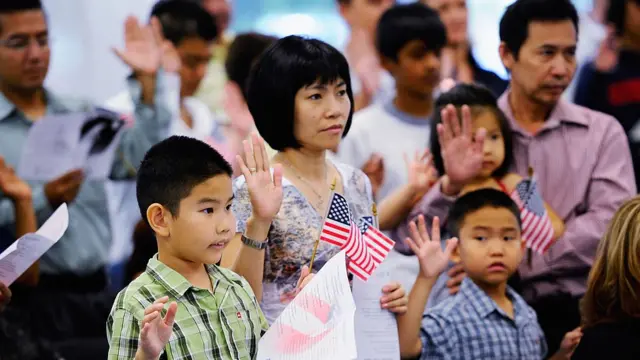 Children And Adults Are Sworn In As US Citizens During Ceremony