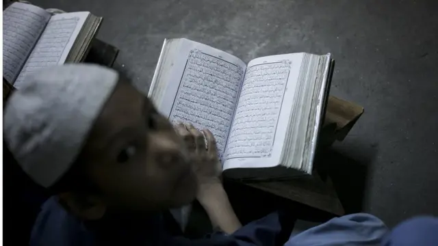 ঢাকার এক মাদ্রাসায় অধ্যয়নরত এক ছাত্র।