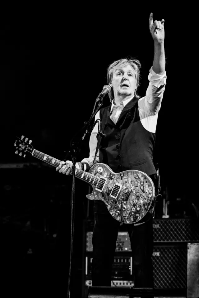 Sir Paul punches the sky during his Glastonbury performance