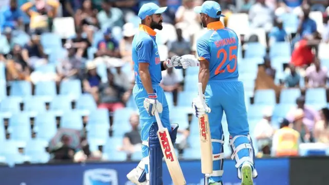 ભારતના બૅટ્સમૅન શિખર ધવન તથા વિરાટ કોહલીની તસવીર