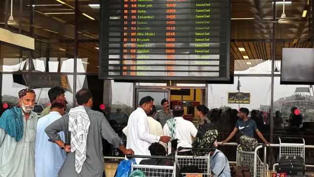 Passengers dey wait forJinnah International Airport afta dem cancel all domestic and international flights for Karachi on May 7, 2025