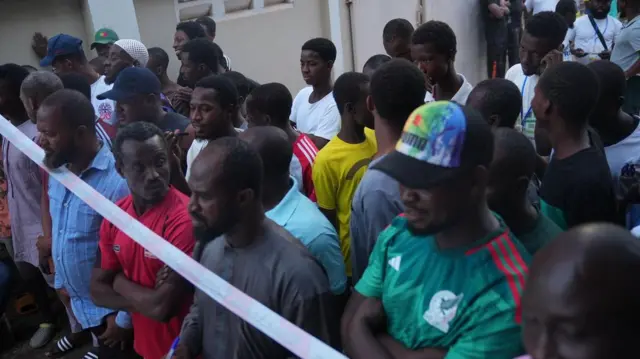 section of people observing collation