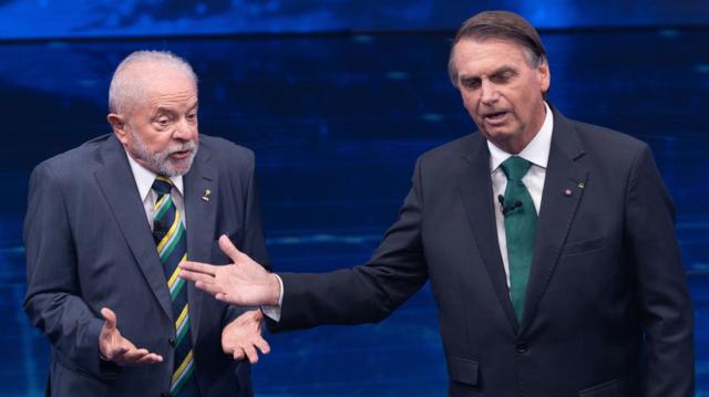 Lula e Bolsonaro durante debate na Band em 2022
