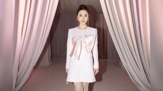 Abby Choi, uma jovem chinesabet 365 whatsappvestido rosa