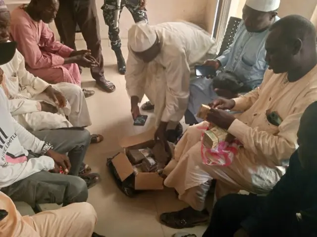 Di business man happy as e see im money return