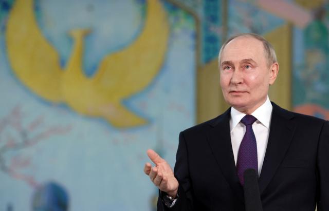 Путін