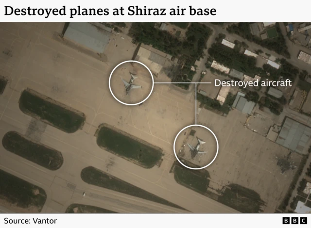 A satellite image showing damage to aircraft at Shiraz air base. The photo shows two destryoed planes sitting on the runway.