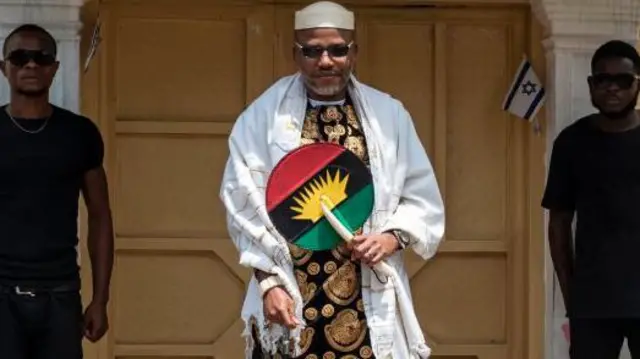 Nnamdi Kanu stand in front of im Afara Ukwu house for Umuahia, Abia State