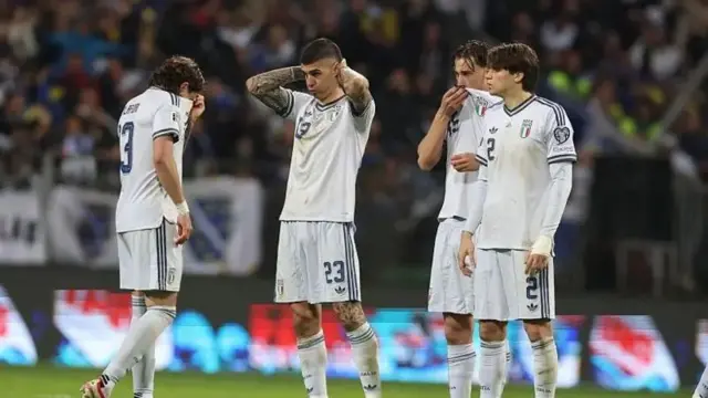 Four Italy players wear dia all-white national jersey as dem express sadness over dia World Cup miss.