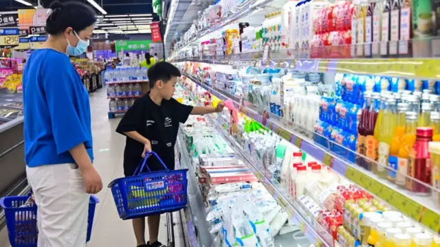 Buyers in supermarket