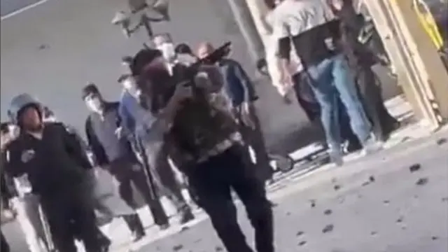 شلیک مامور به معترضان