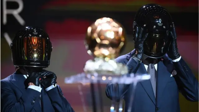 Formula One drivers Fernando Alonso of Spain and Esteban Ocon of France