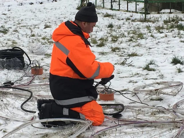 Қорда ишлаётган мигрант