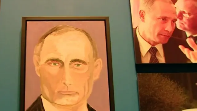 Портрет Путина кисти Буша