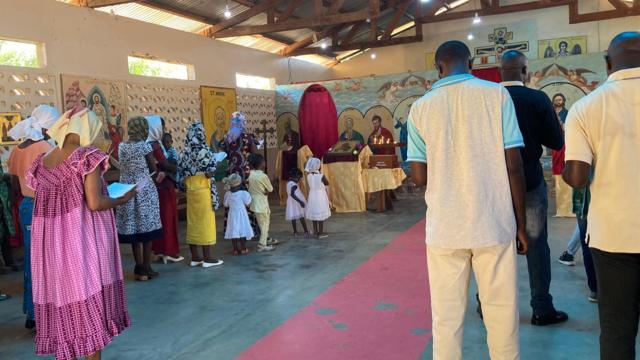 The congregation at Saint-André-Apôtre Russian Orthodox Church in Bangui, CAR