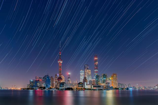 An image of stars over the Lujiazui City Skyline in China