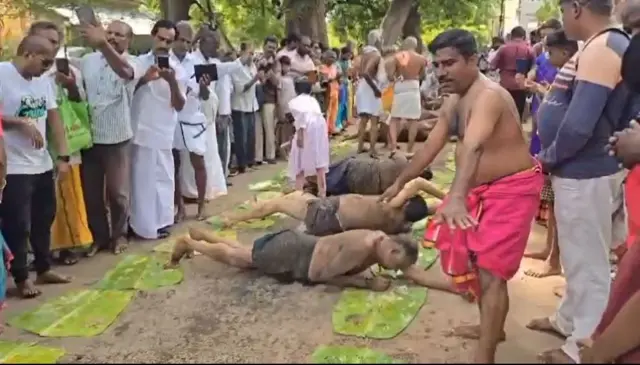 எச்சில் இலை மீது உருள்தல்