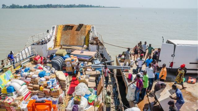 A boat in Bissau harbour preparing to make the journey to the Bijagos