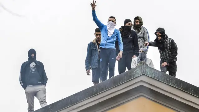 Detainees protest on the roof of the San Vittore prison in Milan, northern Italy, 9 March 2020