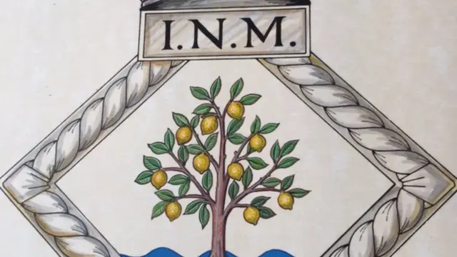 Escudo del INM