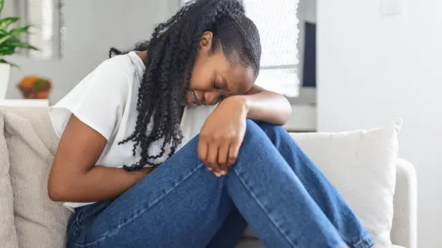 African American Woman dey in pain