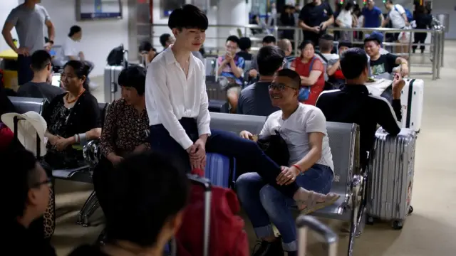 一對同性伴侶凖備在上海登上郵輪