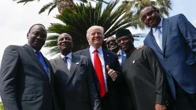 Kenya"s President Uhuru Kenyatta, Guinea"s President Alpha Conde, US President Donald Trump, African Development Bank President Akinwumi Adesina, Vice President of Nigeria Yemi Osinbajo and Ethiopian Prime Minister Hailemariam Desalegn pose following a family photo of G7 leaders with African leaders after an expanded session at the Summit of the Heads of State and of Government of the G7, the group of most industrialized economies, plus the European Union, on May 27, 2017 in Taormina, Sicily.