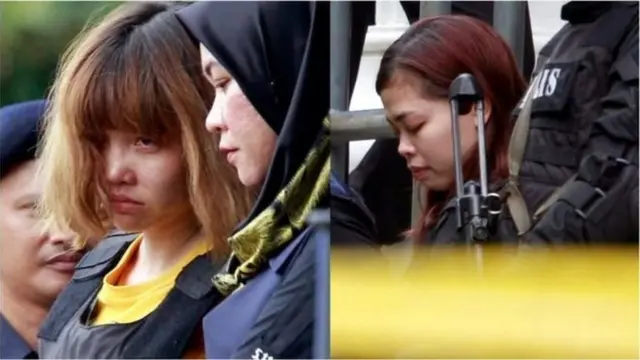 Hai nghi phạm bị dẫn giải ra tòa