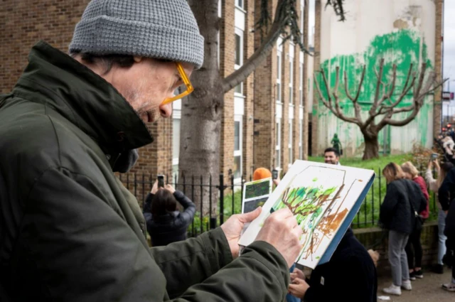 Duvar resminin resmini yapan bir