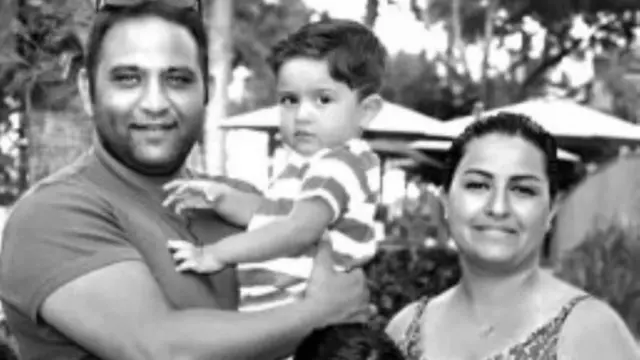 Sawirka ninka ku dhintay shilka, xaaskiisa iyo wiilkiisa yar