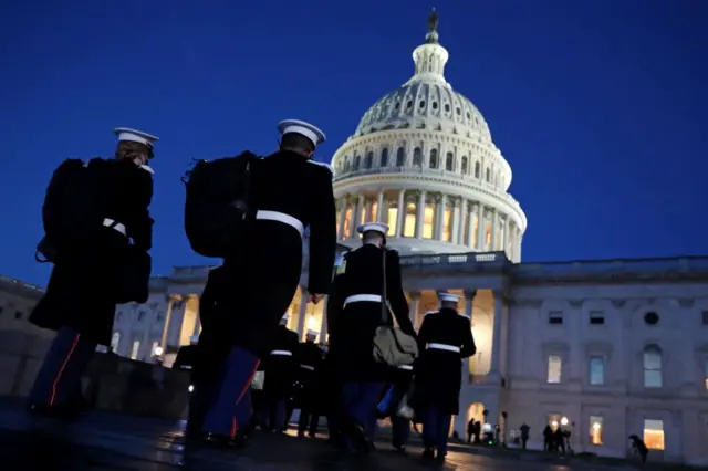 A military band arrives