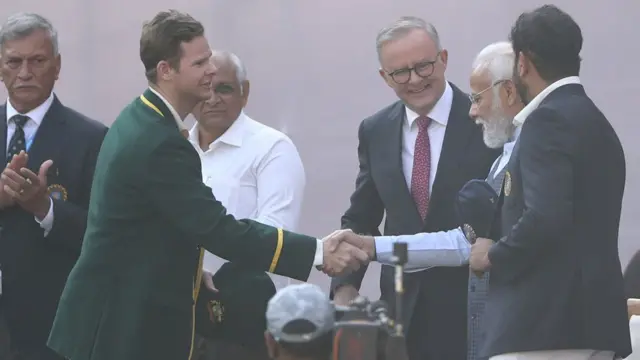 मोदी और स्टीवन स्मिथ