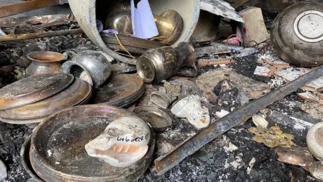 চৌমুহনীতে এক হিন্দু ব্যবসায়ীর জ্বলে যাওয়া দোকান।