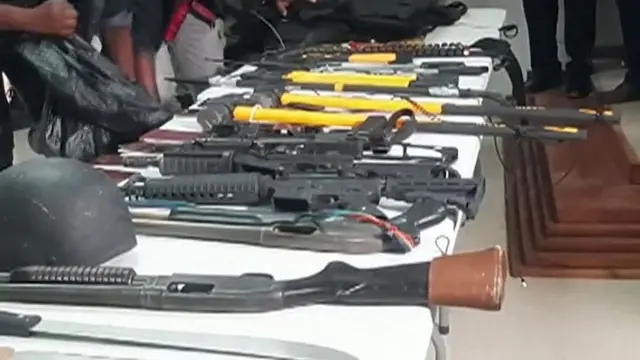 হাইতির আক্রমণকারীদের কাছ থেকে উদ্ধার করা অস্ত্র