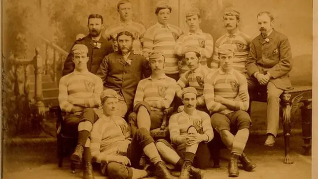 The image from 1882 is the Scotland team that defeated England 5-1 at first Hampden Park. This was the first time that the players received caps as a presentation gift and they can be seen wearing them.